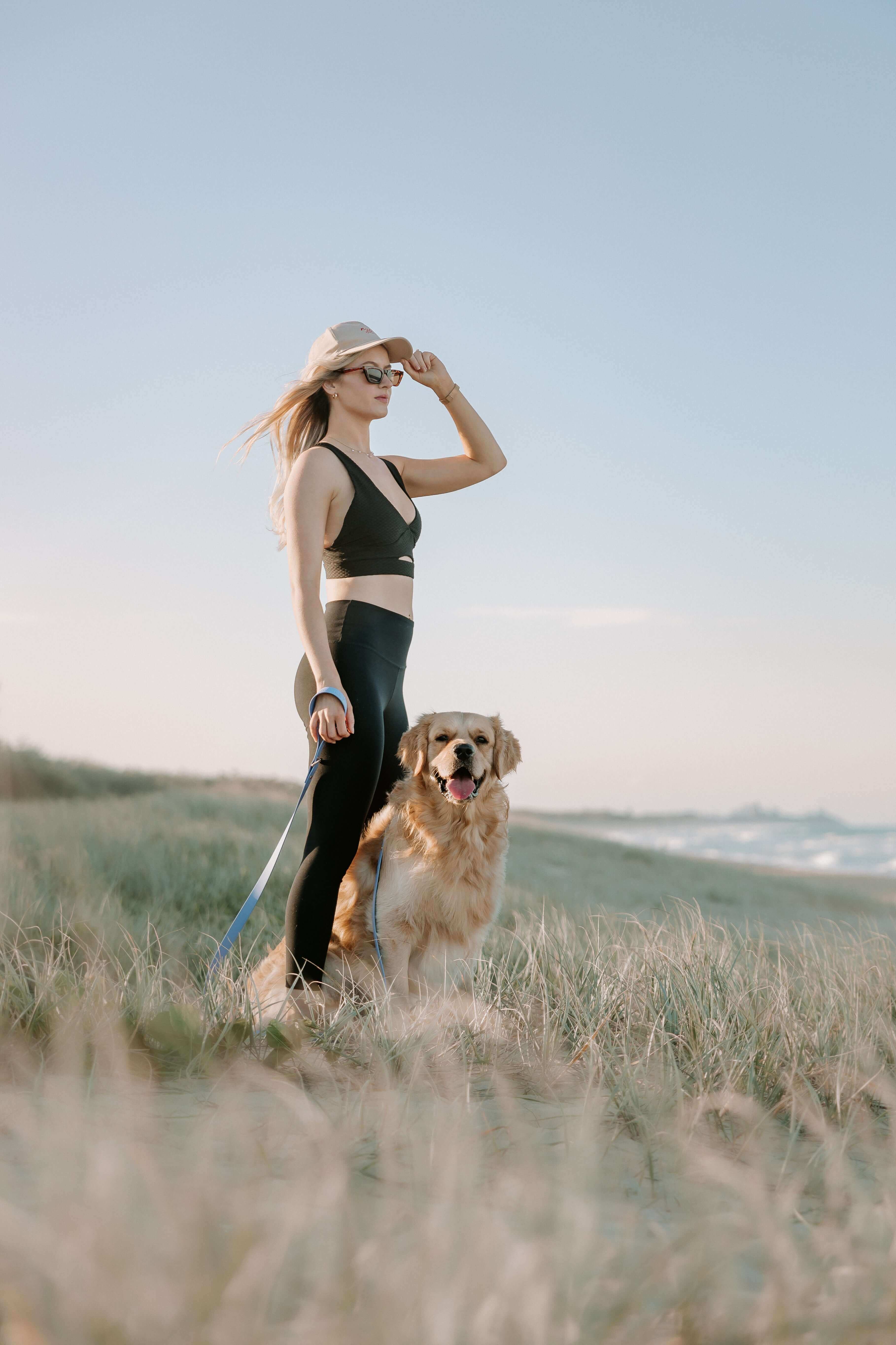 Custom dog collar and leash in action during an outdoor walk, showing off durability and waterproof design.